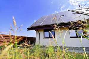 Image of a home with solar panels on the roof
