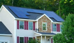 Beautiful home with solar panels on the roof